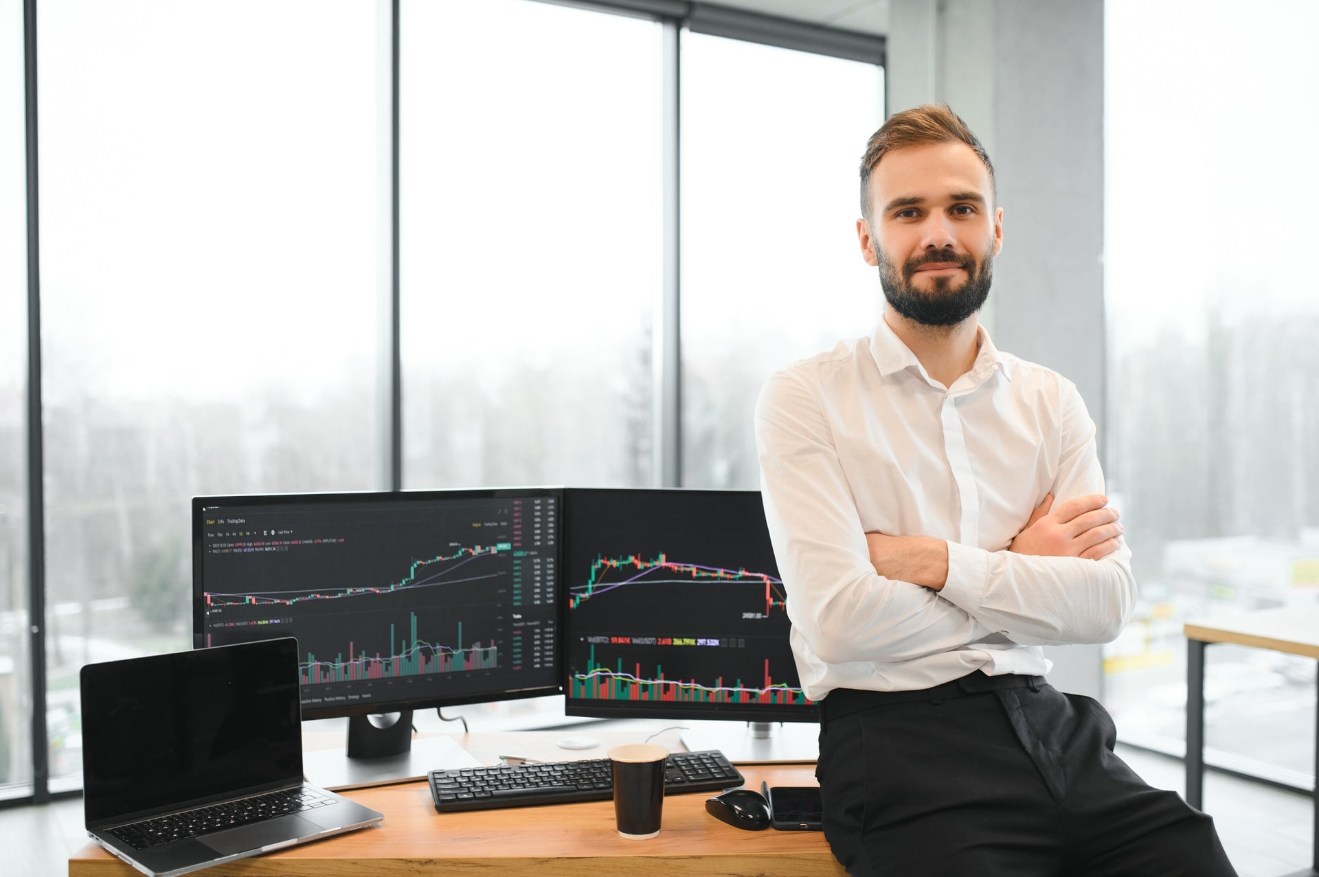 crypto-trader-sits-at-his-workplace-in-front-of-a-2024-01-16-18-47-53-utc-2-min